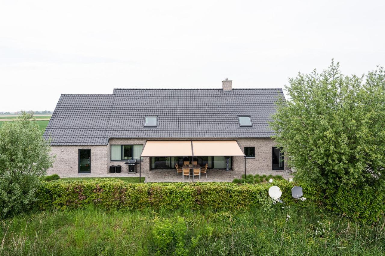 Polderwoning 'cleylantshof' Casa de Férias Sint-Laureins